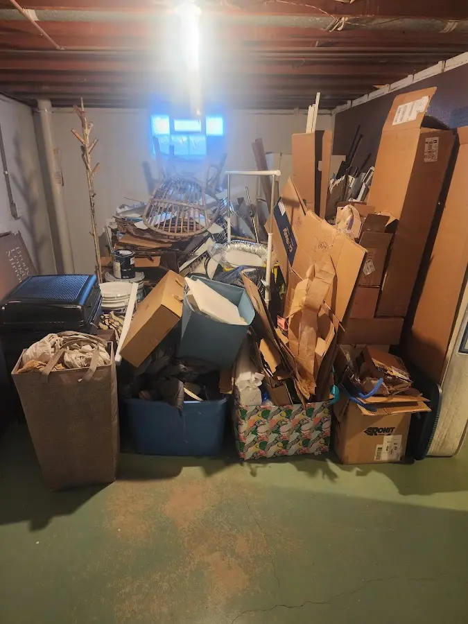 Roll-off dumpster container at job site for 2 Yard Dumpster Rental in Fairfax